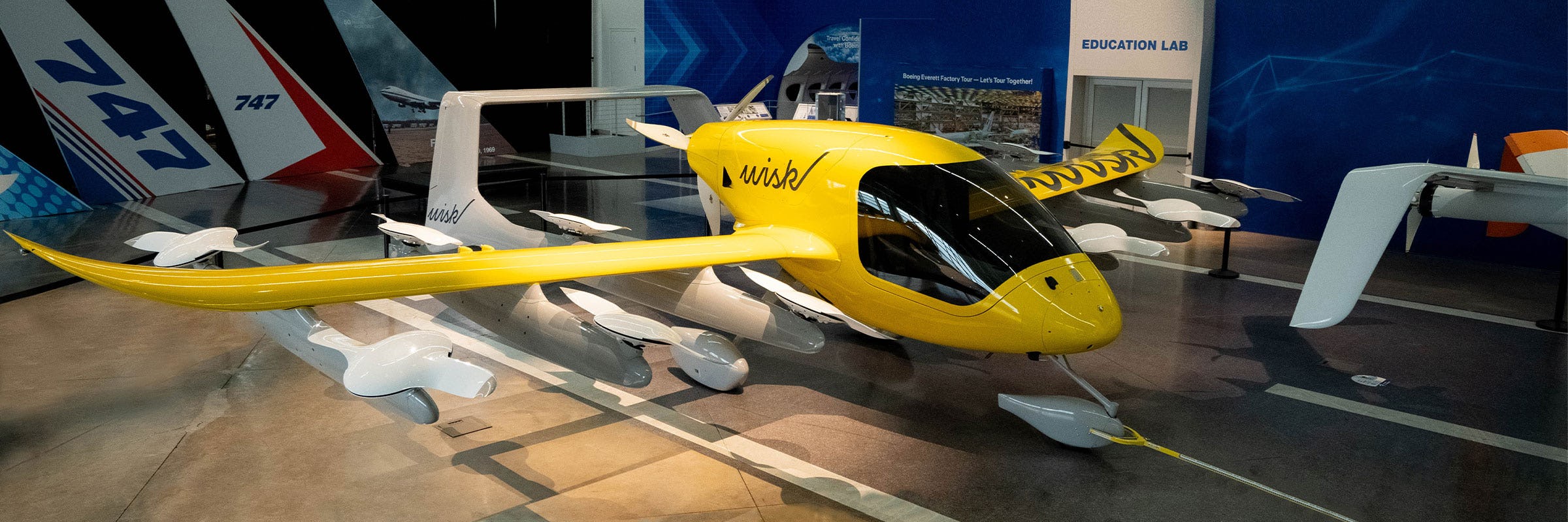 Wisk Aero Gen 5 featured on the Boeing Everett Factory Gallery floor.